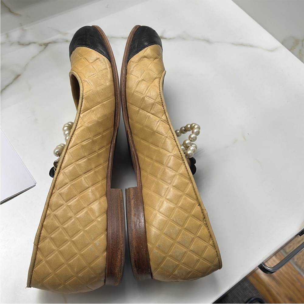 AUTHENTIC CHANEL Black and Tan Flats with Pearl Embellishments - Picture 9 of 13